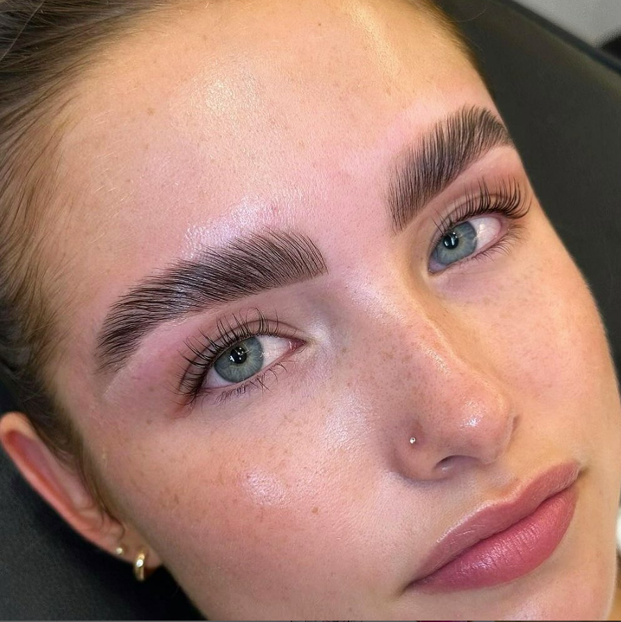 Woman with Brow Lamination and Lash Lift freshly done.